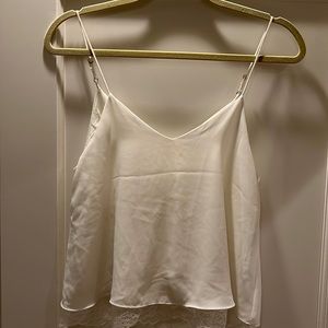 Zara white silky camisole w lace detail at bottom.